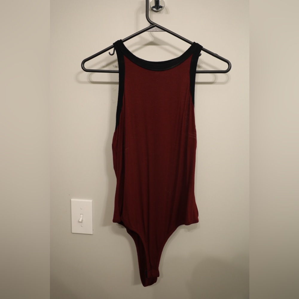 Red and black body suit